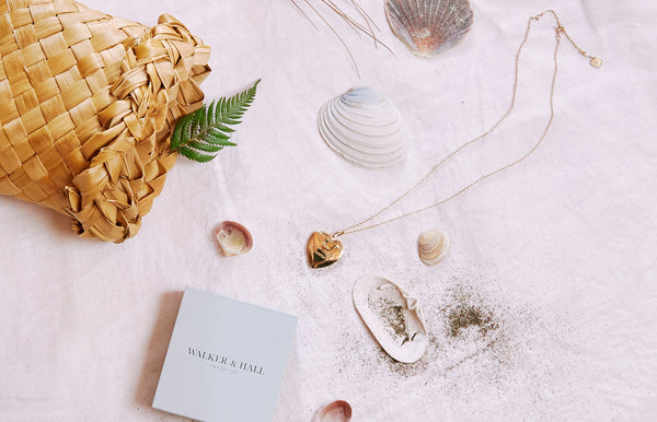 Heart locket, Walker & Hall jewellery box and beach shells