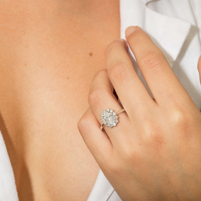 Model wearing oval cut diamond Belle Ring