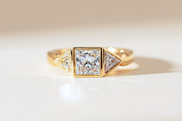 Princess cut diamond three stone ring