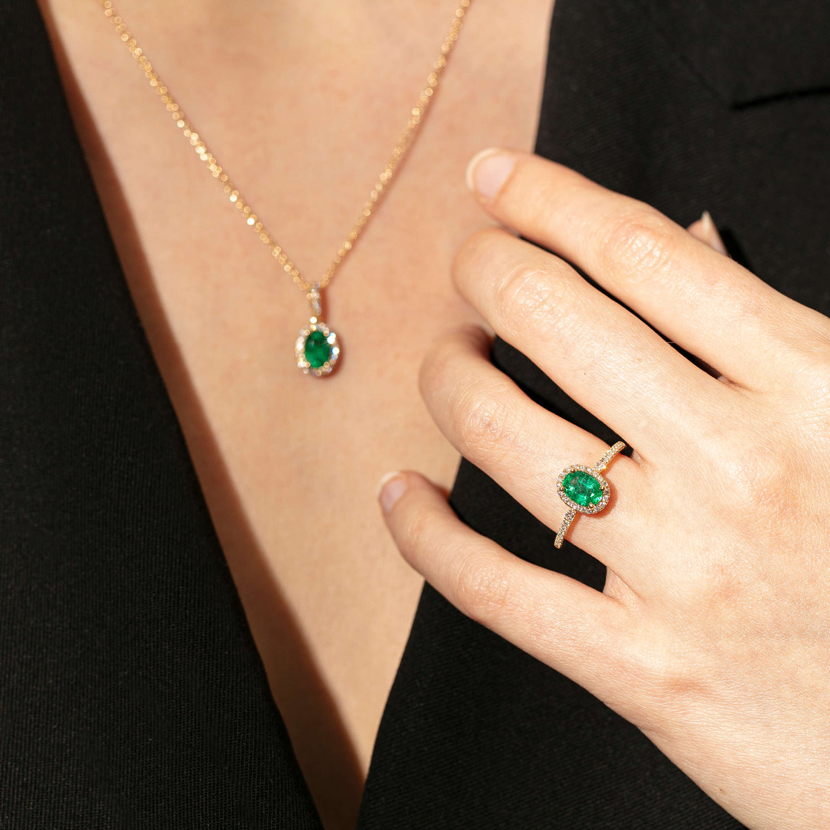 Model wearing Emerald and Diamond Sierra Ring and Pendant