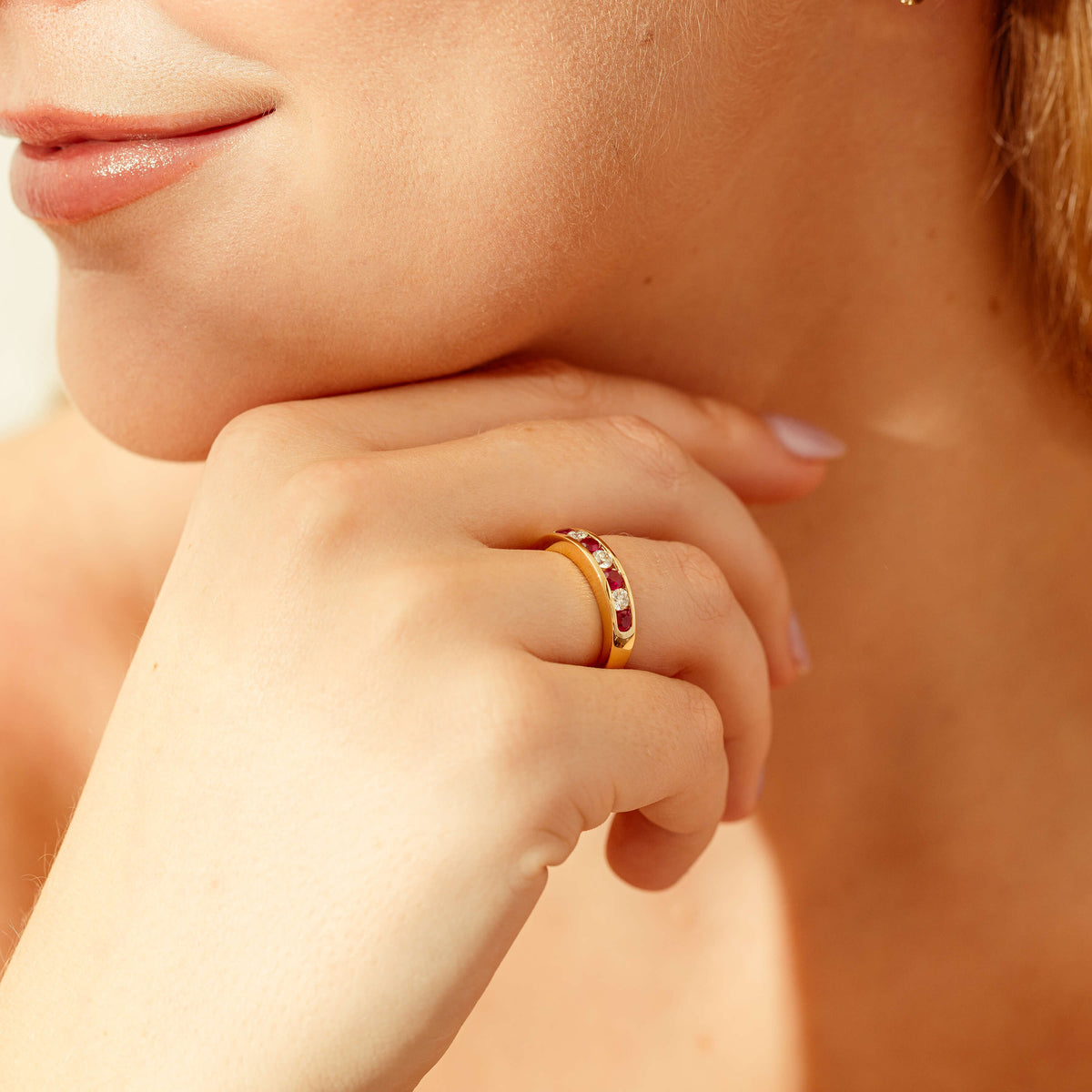 Model wearing natural diamond and ruby Tigris Ring