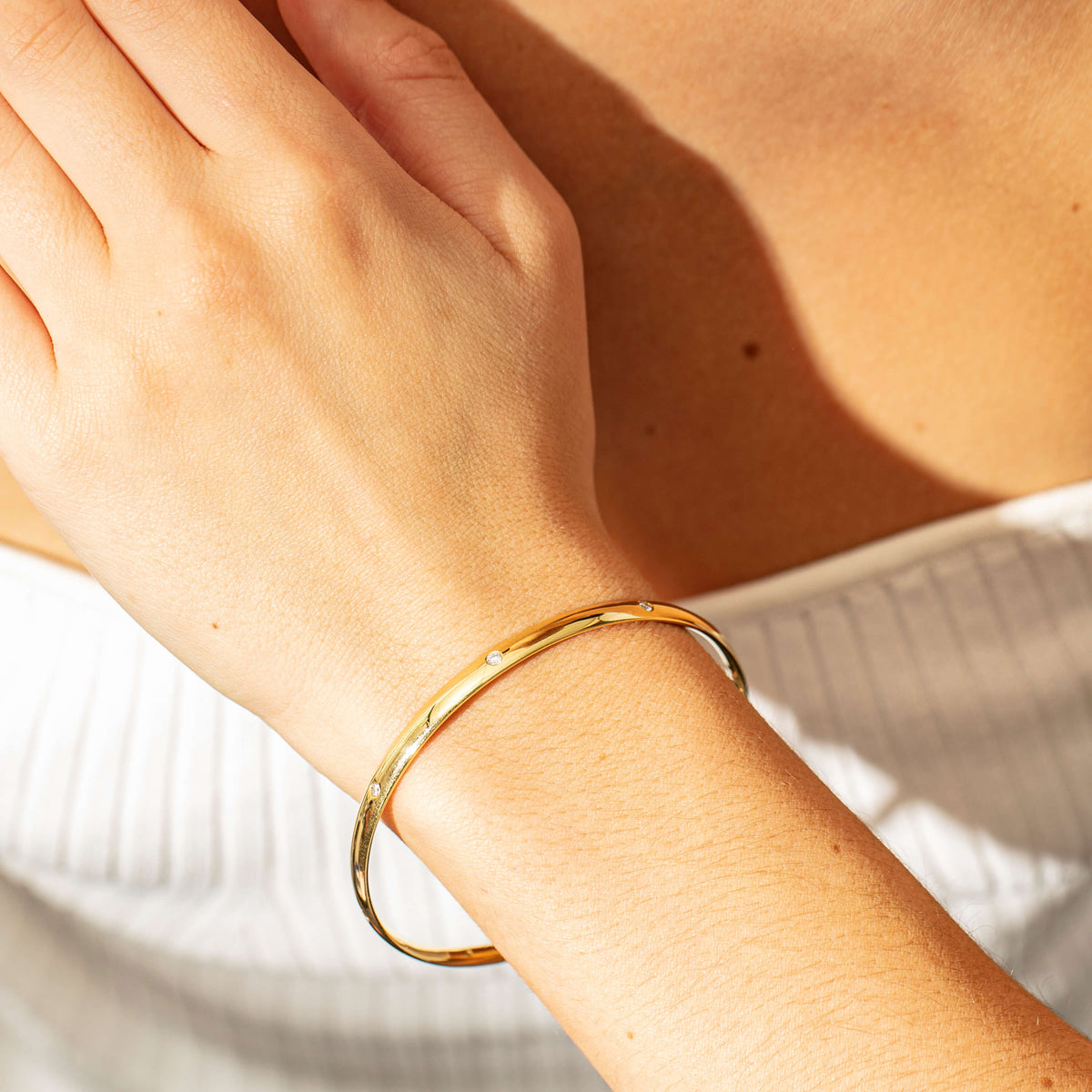 Model wearing natural diamond Lucky Bangle