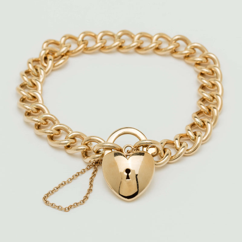 Deja Vu 9ct Gold Solid Curb Bracelet with Puff Heart Padlock