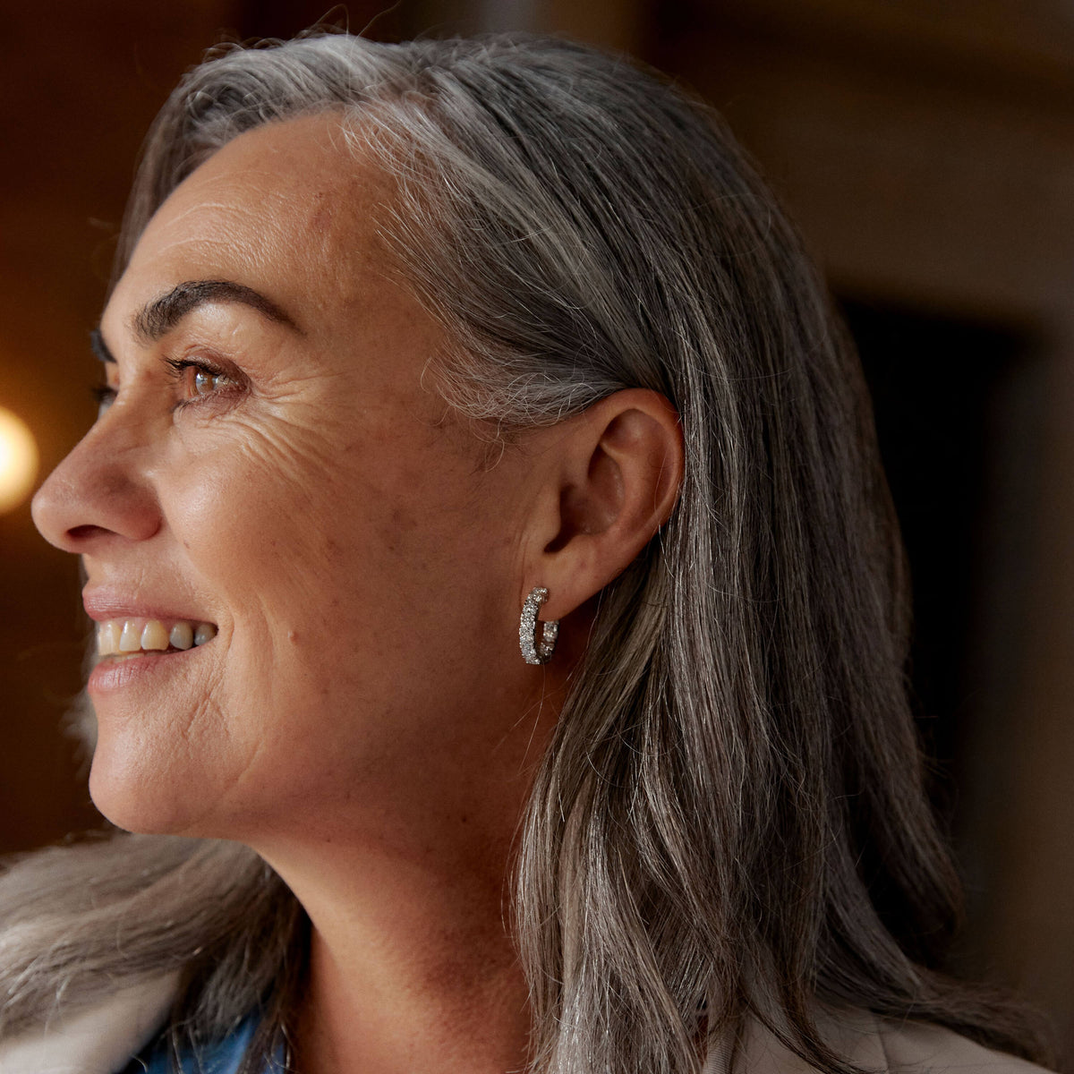 Model wearing diamond Jubilee Earrings