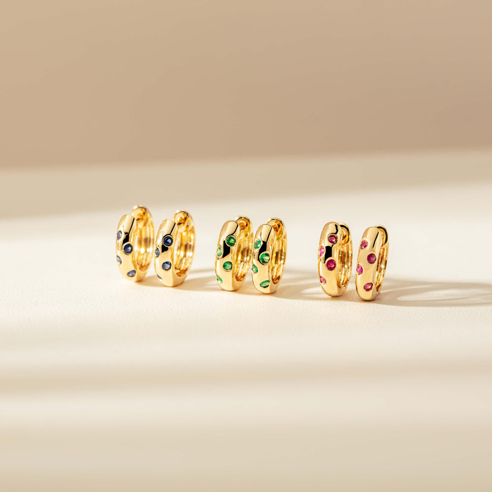 18ct Yellow Gold .13ct Emerald Lucky Huggie Earrings