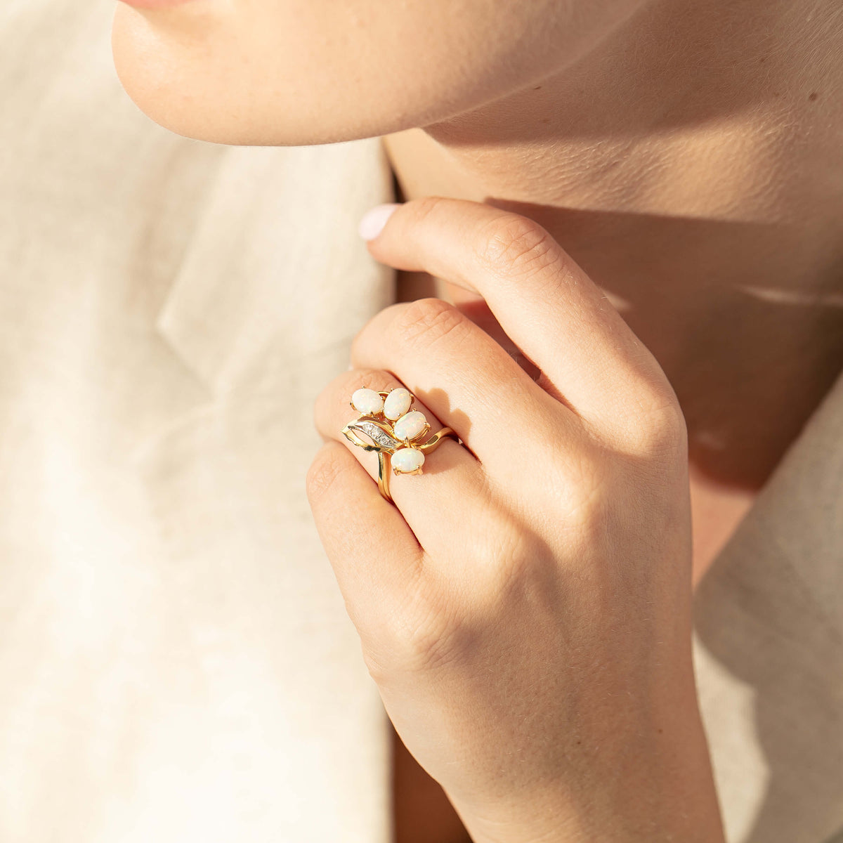Model wearing Deja Vu opal ring