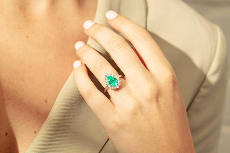 Model wearing Emerald and Diamond Belle Ring