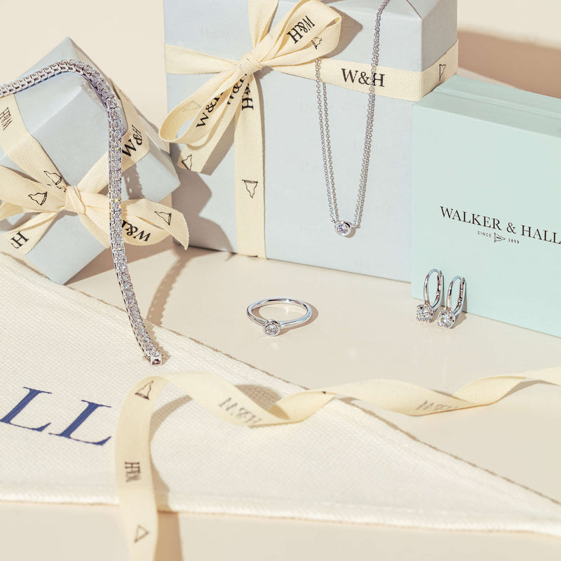 Natural diamond jewellery with wrapped Walker & Hall gift boxes