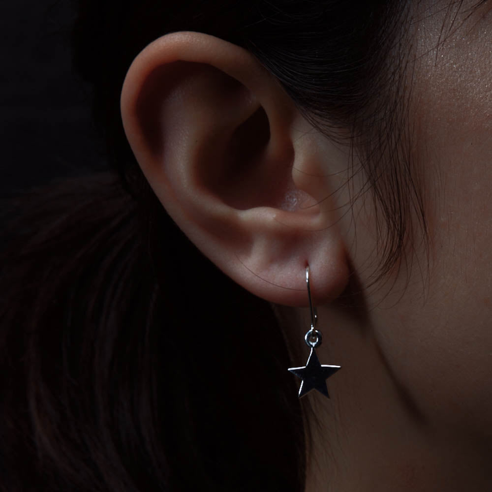 Karen walker store star earrings