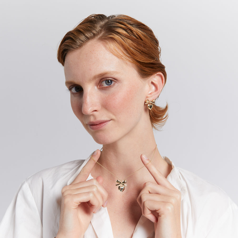 Karen walker bow earrings store