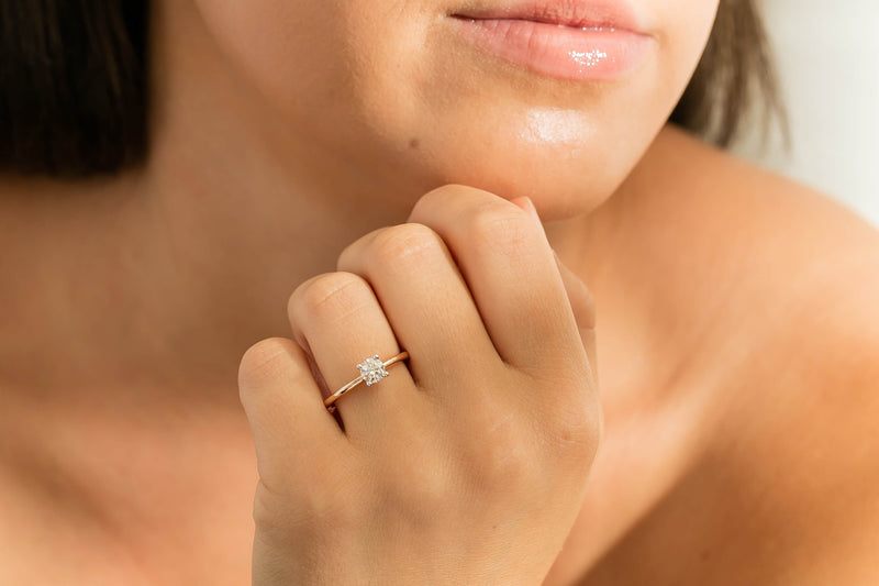 Model wearing rose gold diamond Melba ring