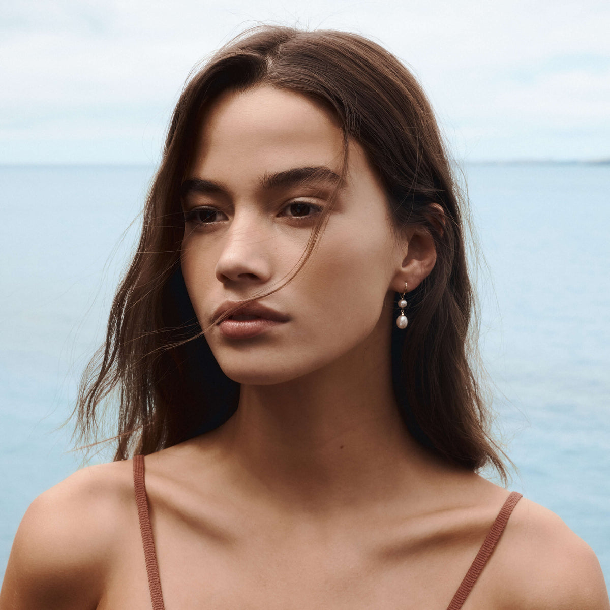 Model wearing yellow gold Rosie Earrings