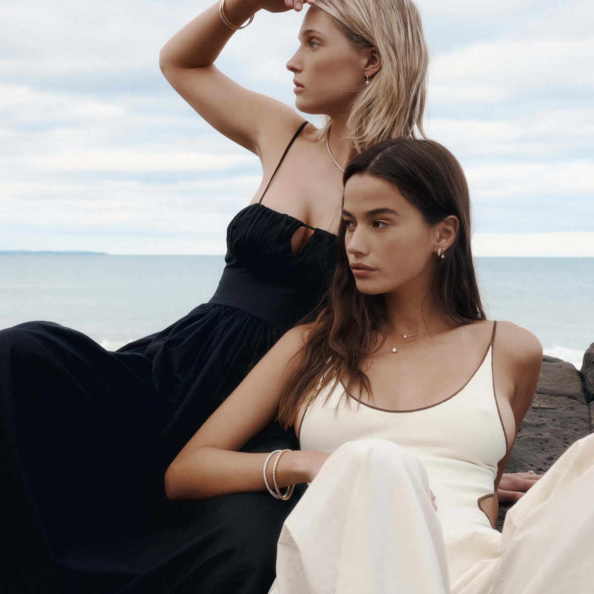 Models wearing gold & diamond jewellery on beach