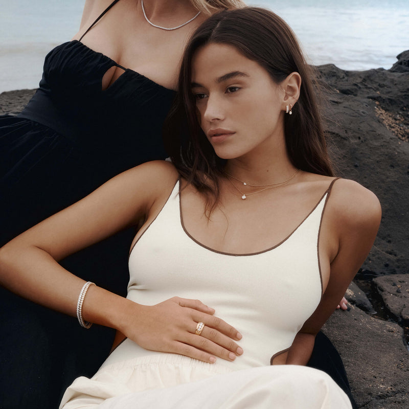 Models wearing natural diamond jewellery on NZ beach