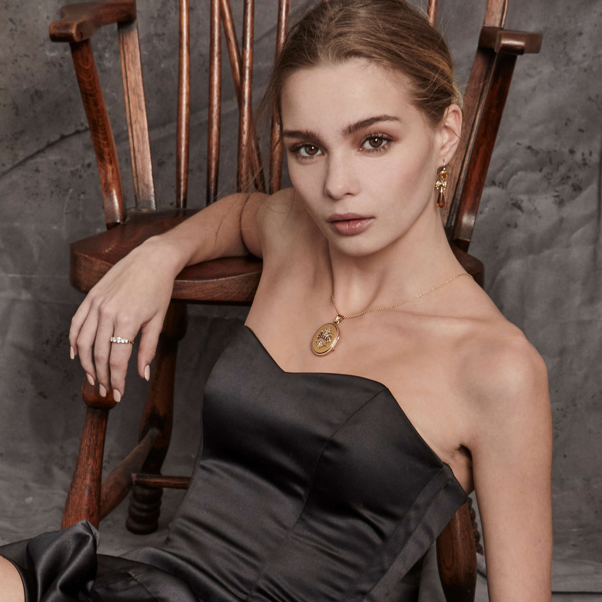 Model wearing Vintage necklace, ring and earrings