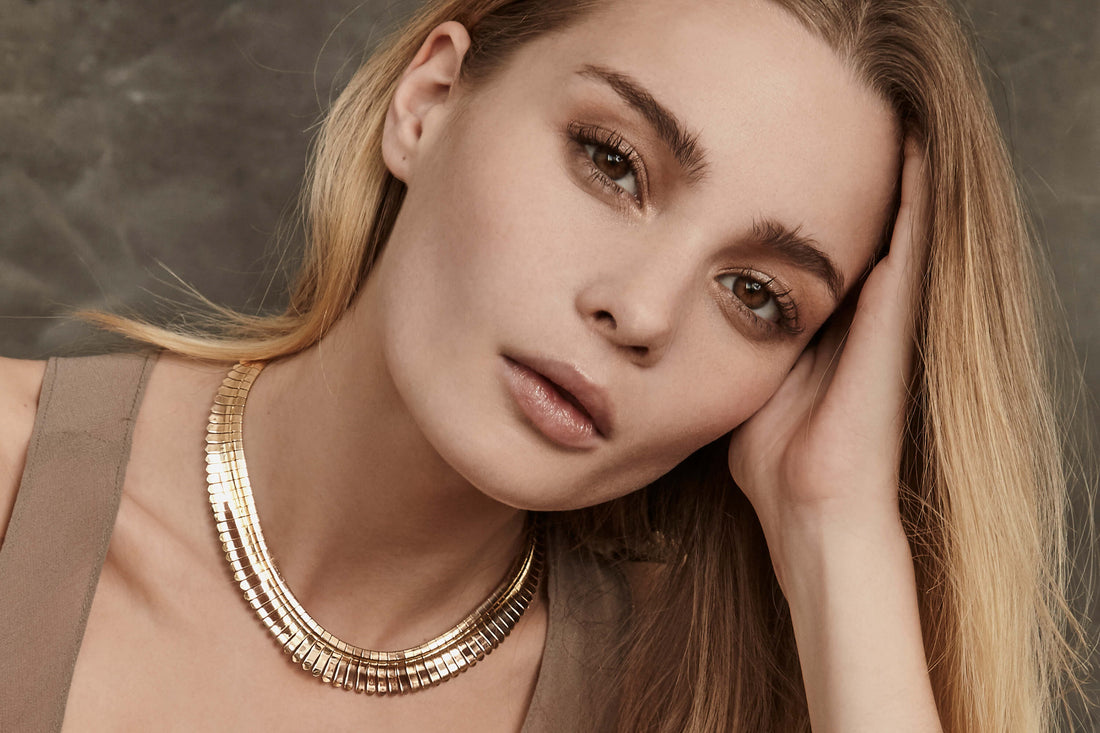 Model wearing Retro style gold necklace