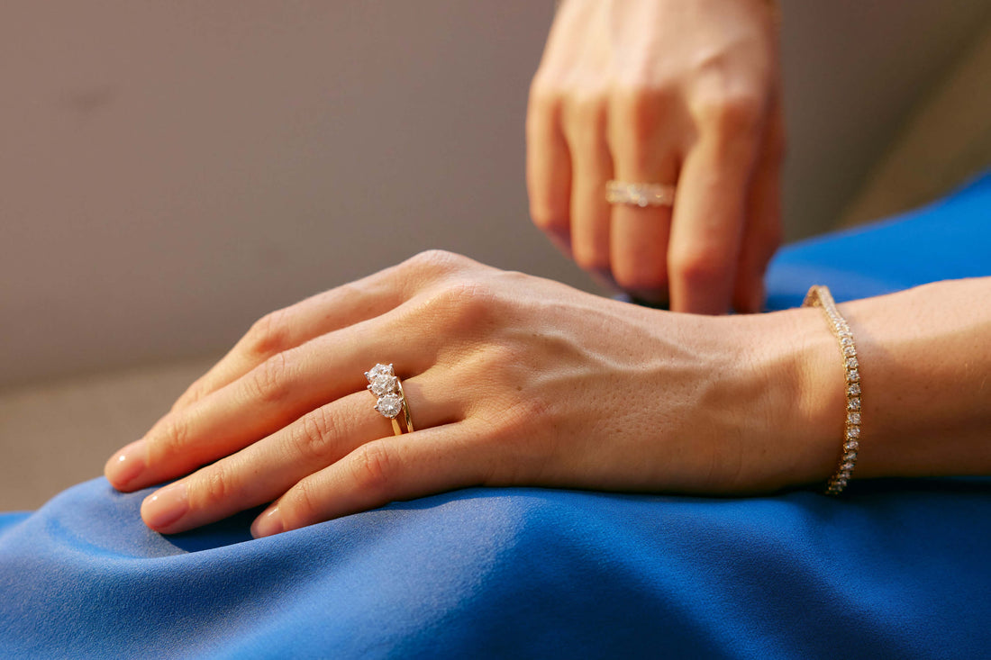 Model wearing diamond Coronado Ring, diamond Panorama Ring and diamond Jubilee Bracelet