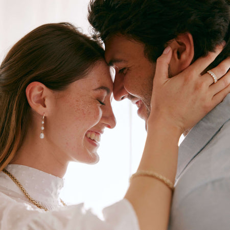 Couple smiling and embracing