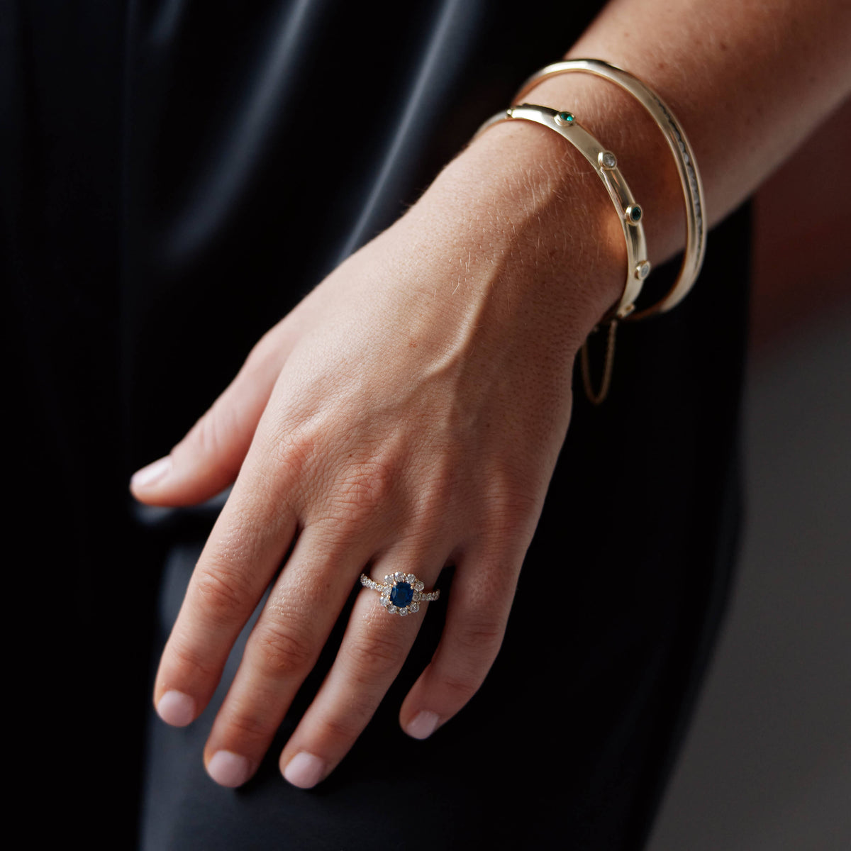 Model wearing Deja Vu Collection ring and bracelets