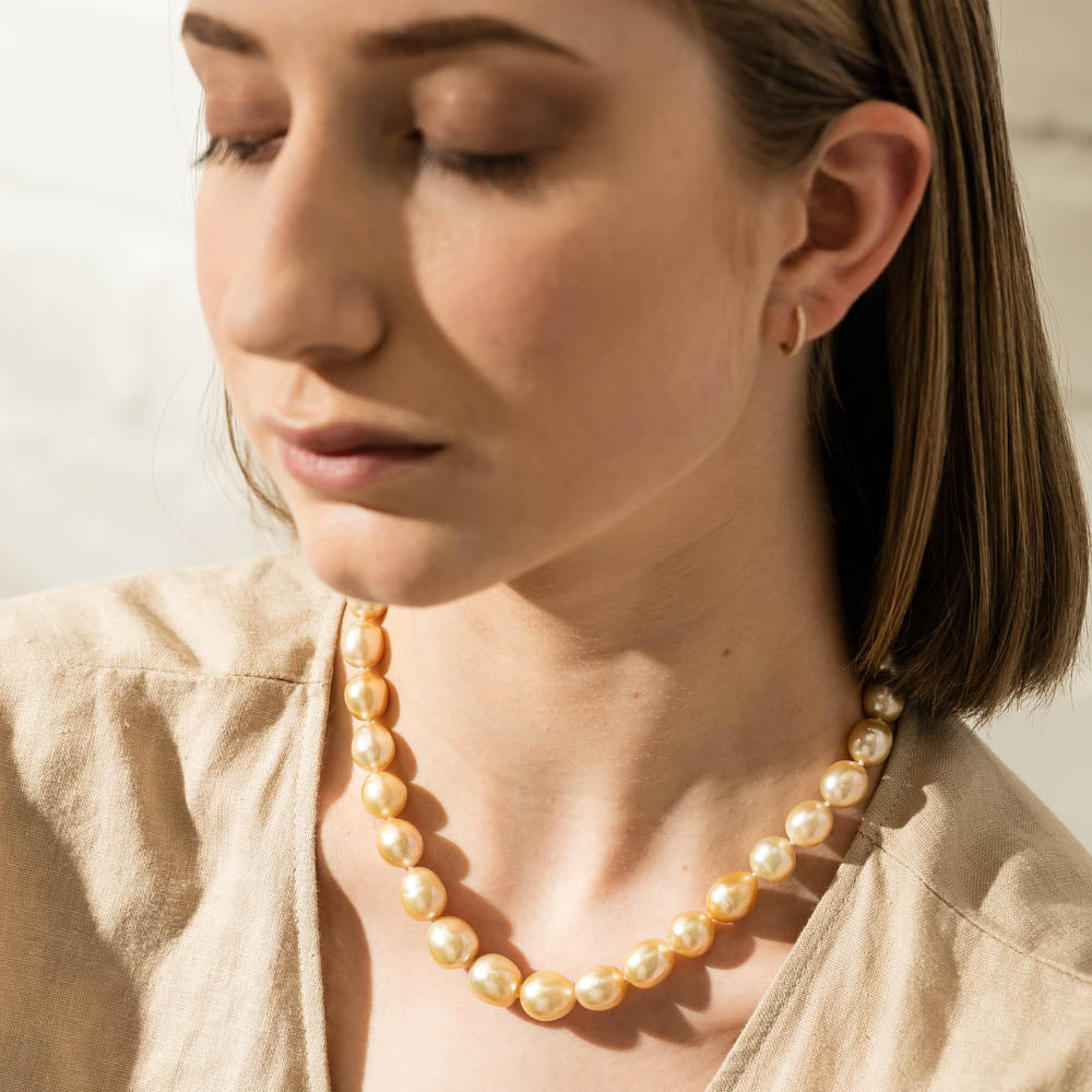 South sea pearl necklace with closed setting diamond pendant